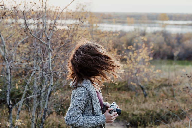 Saskatoon child in field playing rural shot tourist.jpg
