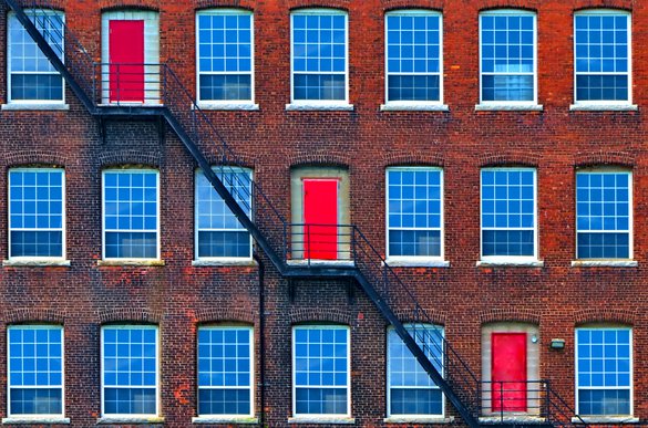 St Catharines blue windows red doors diagonal contrast downtown building rentals rental.jpg