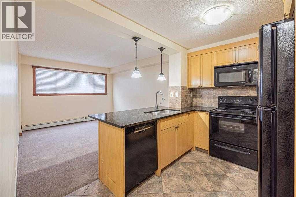 111, 920 68 Avenue SW - Photo 1