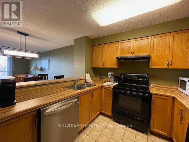 711 - 2155 BURNHAMTHORPE ROAD W - Photo 7