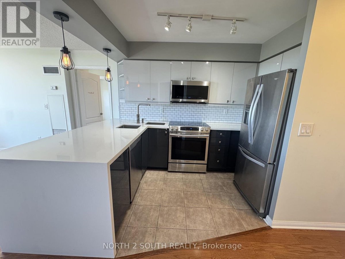 1002 - 1150 PARKWEST PLACE - Photo 2