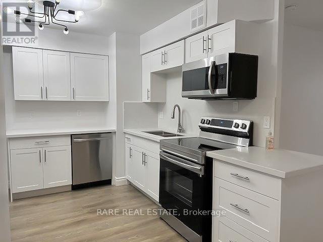 712 - 3605 KARIYA DRIVE - Photo 2