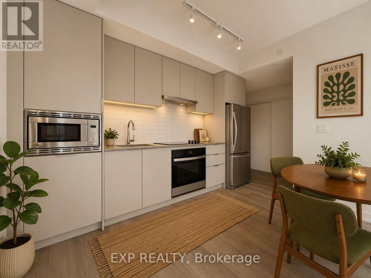 1002 - 3079 TRAFALGAR ROAD - Photo 2