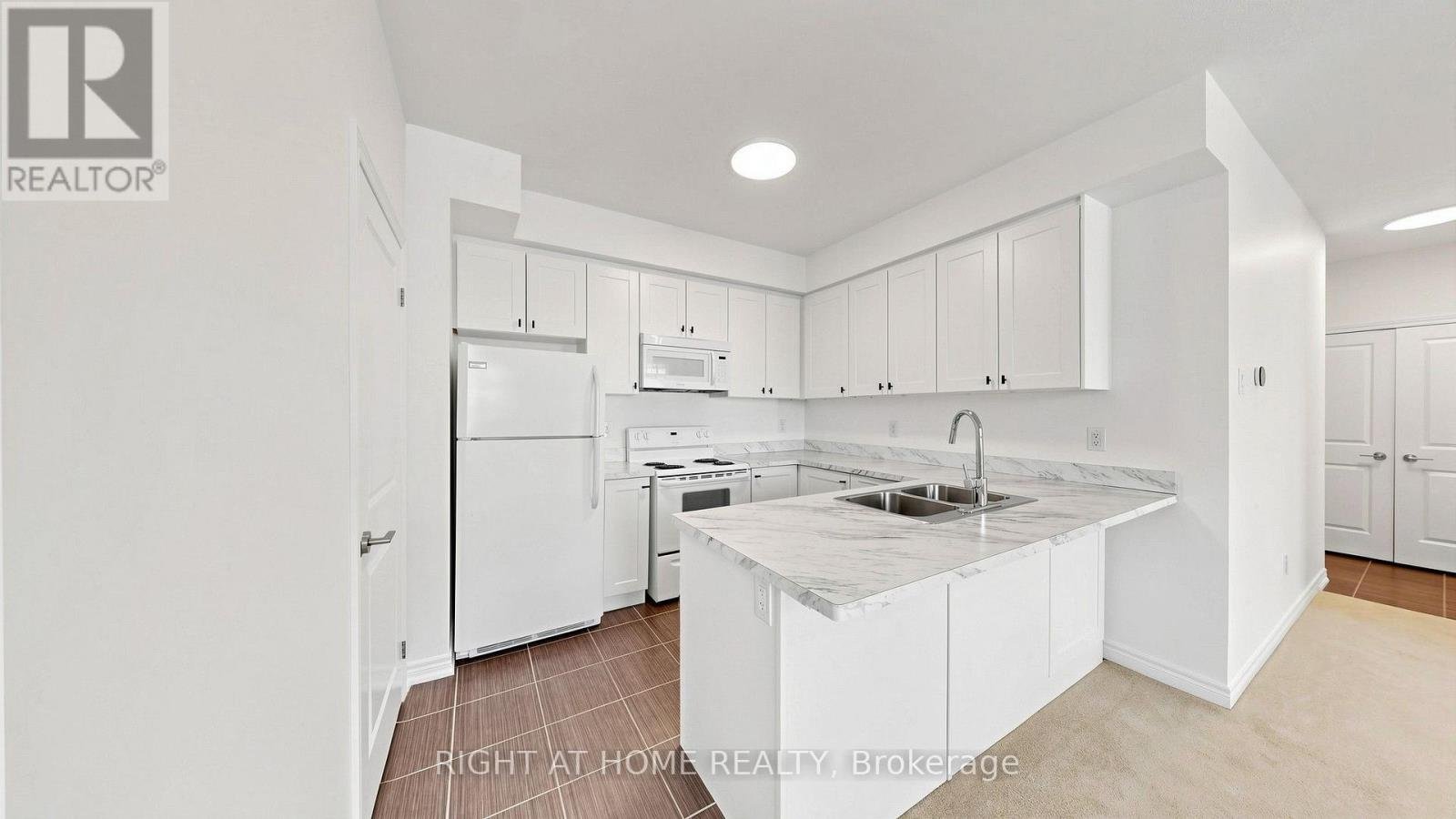 205 - 2333 SAWGRASS DRIVE - Photo 1