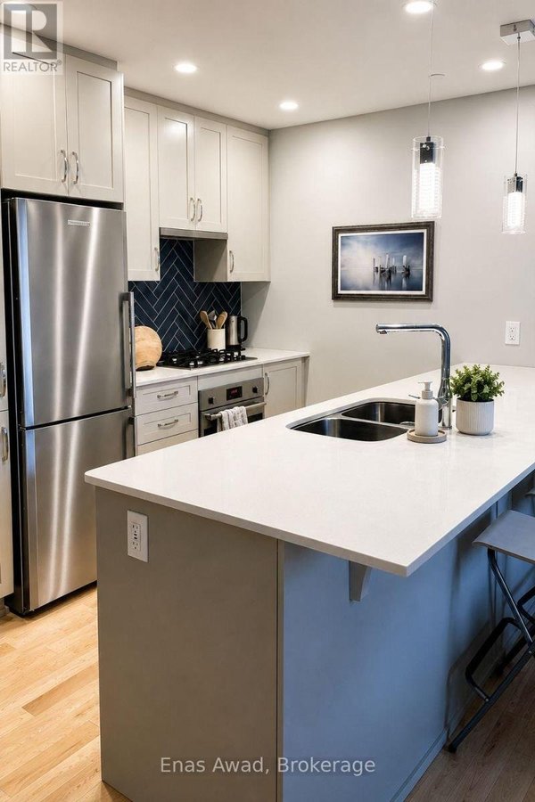 301 - 60 SPRINGHURST AVENUE - Photo 2