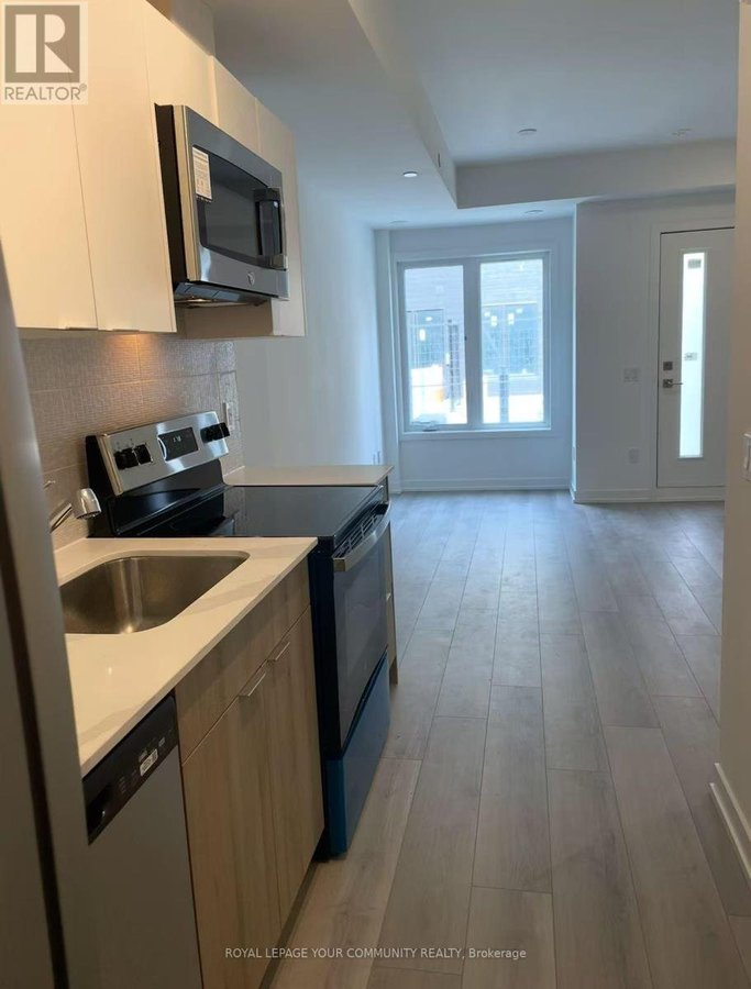 6 - 3069 PHARMACY AVENUE - Photo 3