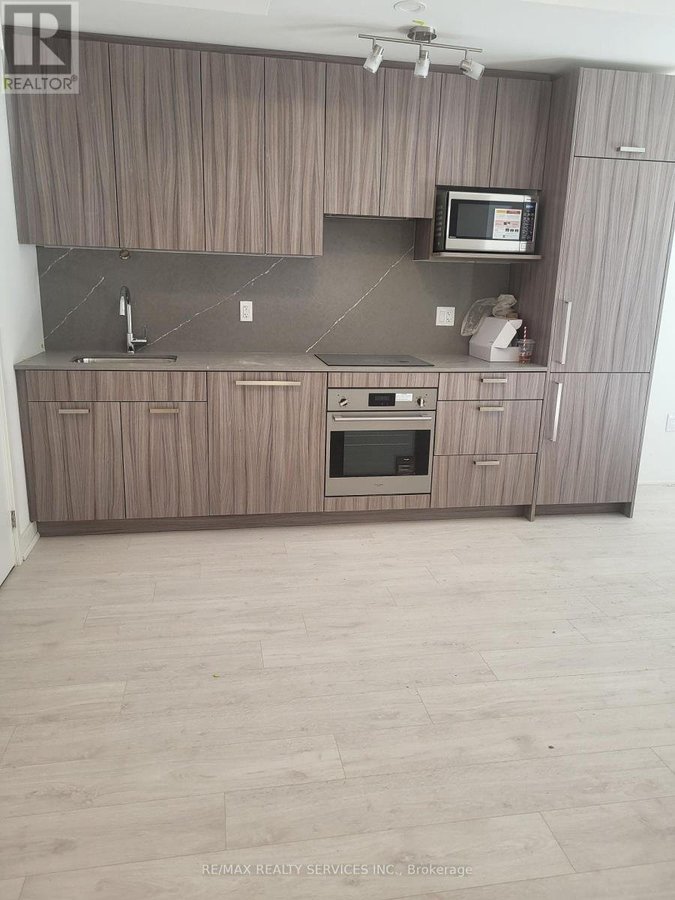 BLOCK D - UNIT 130 - 75 CURLEW DRIVE - Photo 2