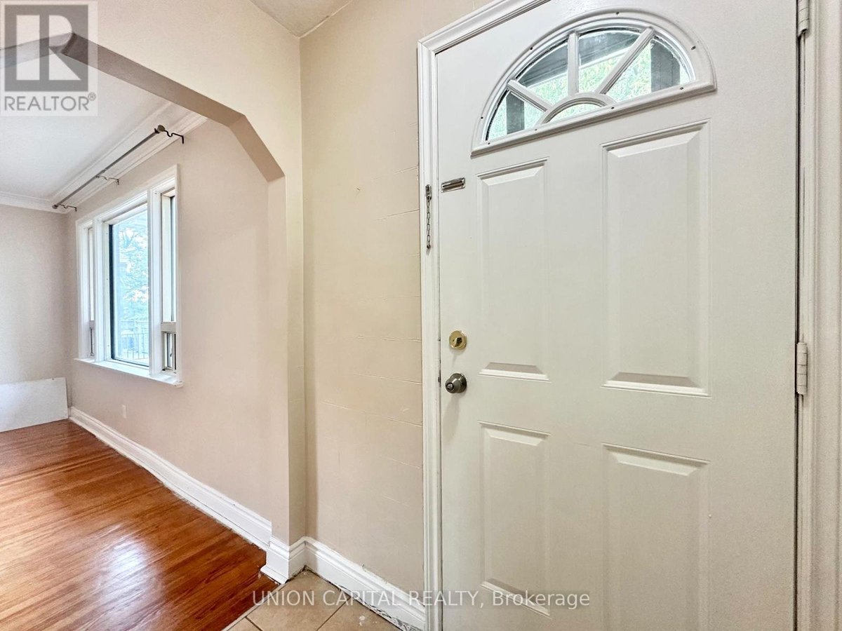 MAIN FLOOR - 1048 KENNEDY ROAD - Photo 2