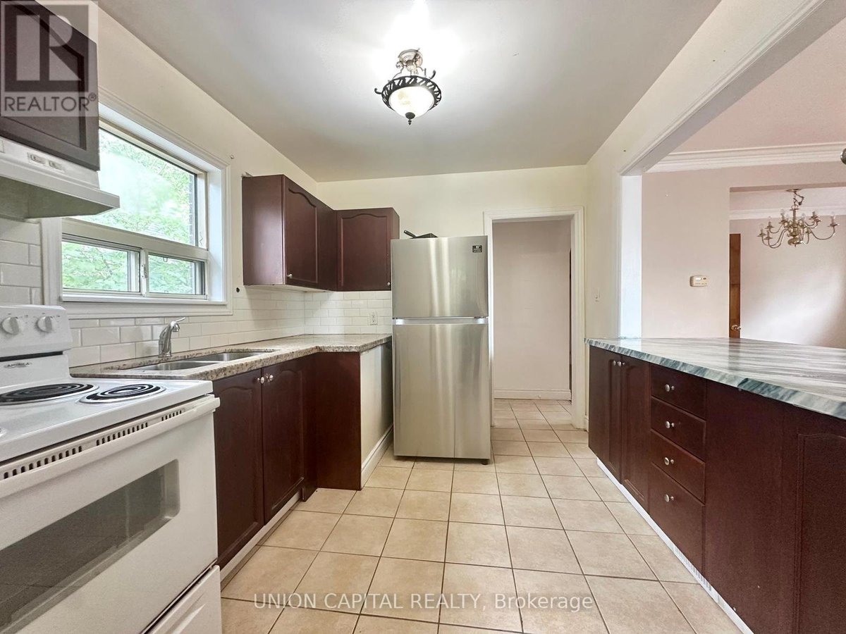 MAIN FLOOR - 1048 KENNEDY ROAD - Photo 3