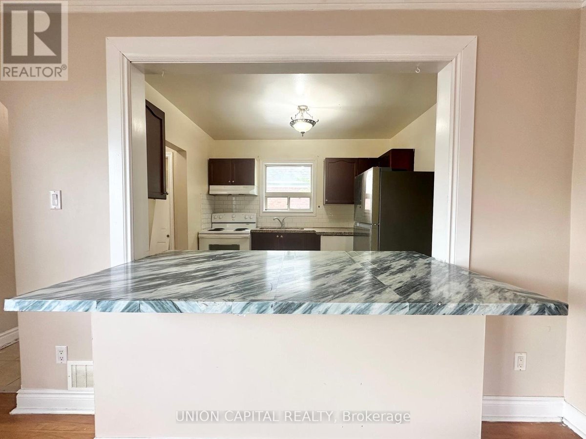 MAIN FLOOR - 1048 KENNEDY ROAD - Photo 6