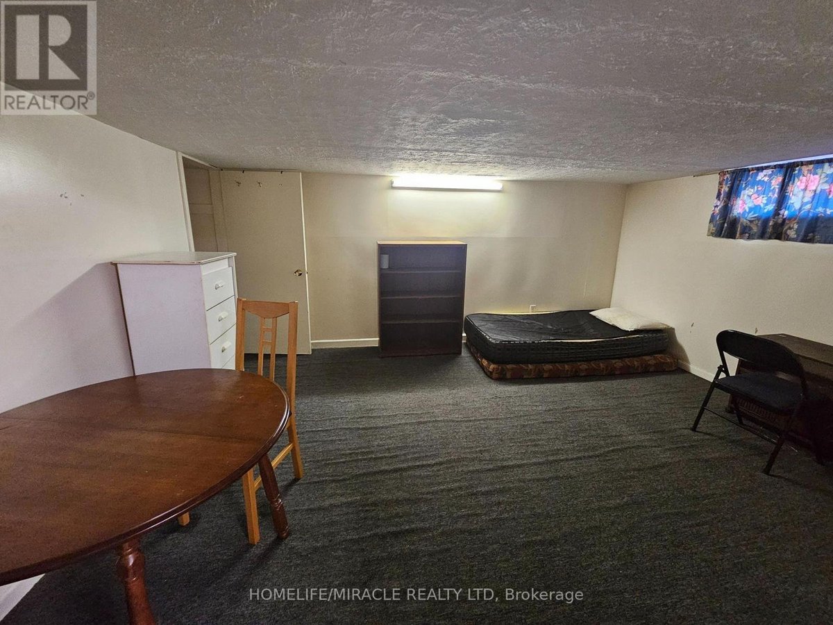 BSMT ROOM - 898 KENNEDY ROAD - Photo 3