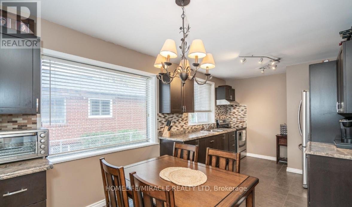 MAIN FLOOR - 511 KENNEDY ROAD - Photo 4