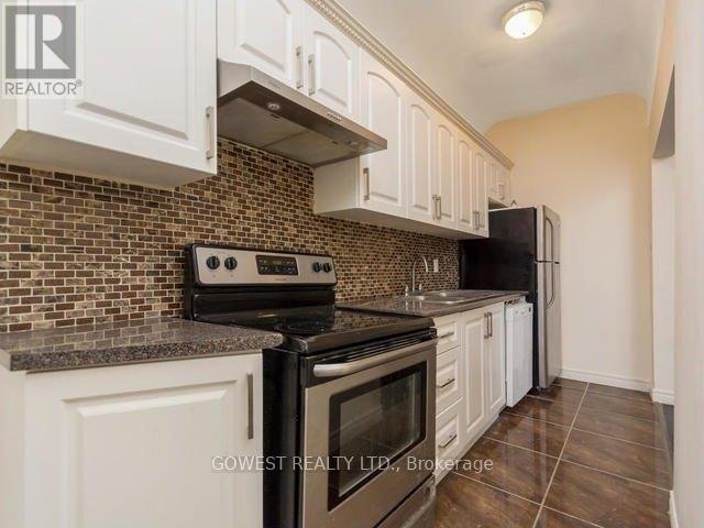 MAIN#1 - 2011 DUNDAS STREET W - Photo 2