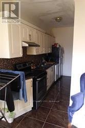 MAIN#1 - 2011 DUNDAS STREET W - Photo 8