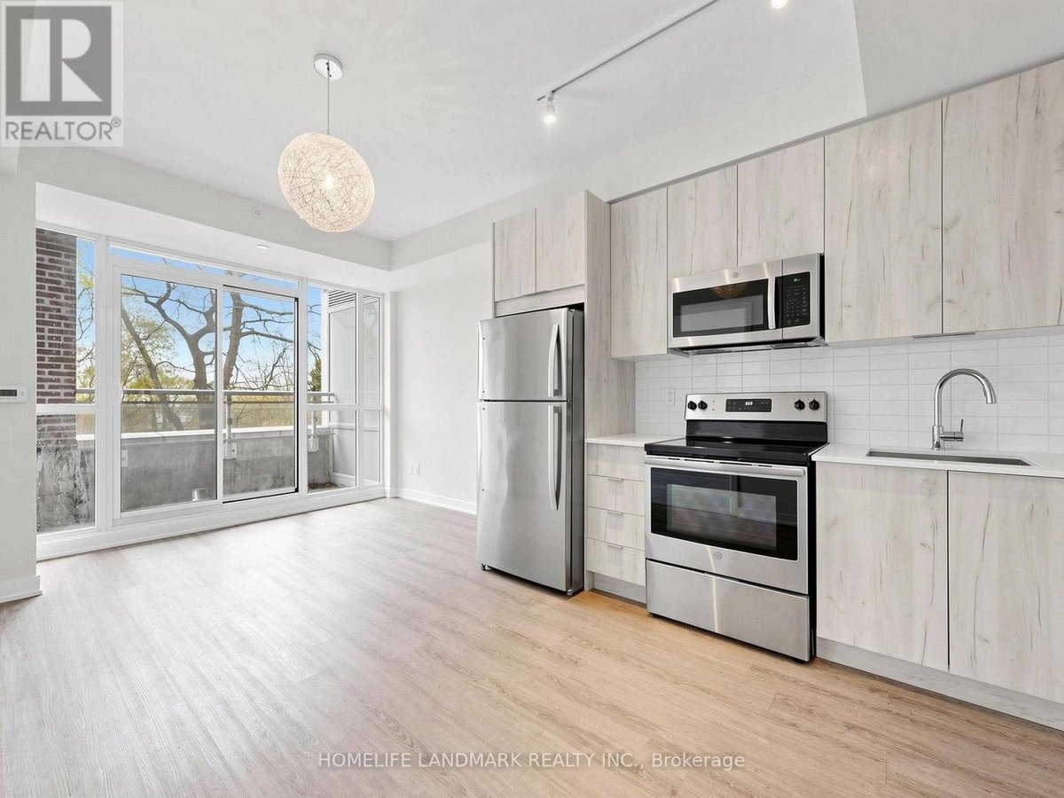 209 - 1350 KINGSTON ROAD - Photo 6