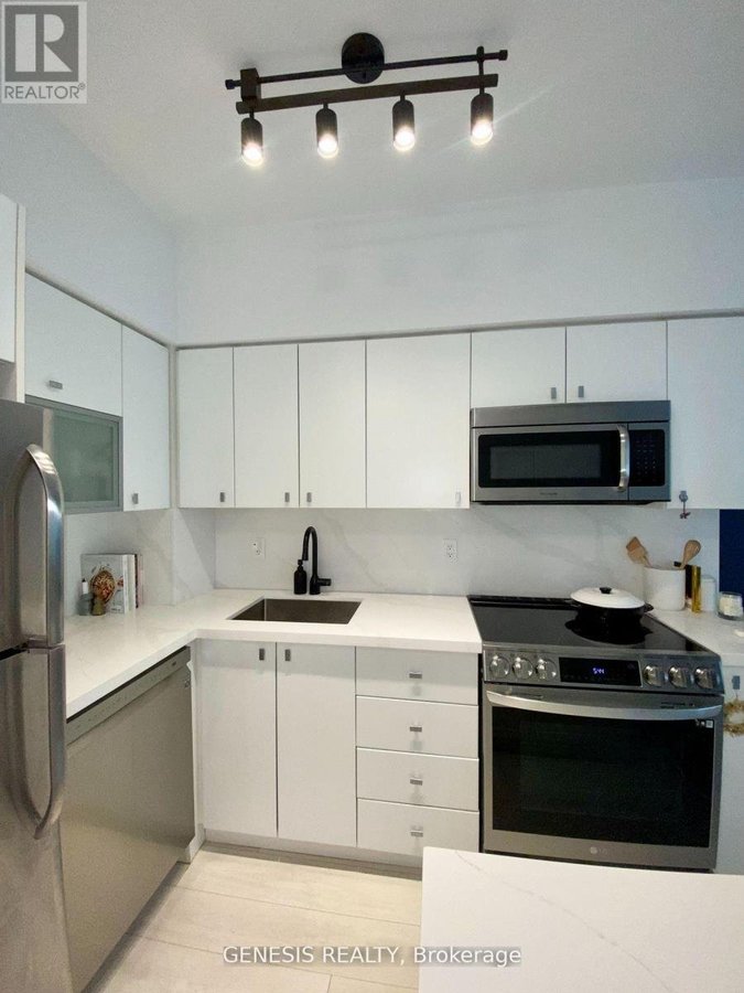 205 - 69 LYNN WILLIAMS STREET - Photo 6