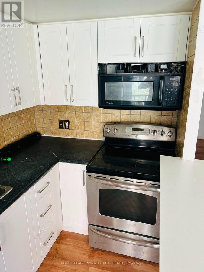 210 - 26 WESTERN BATTERY ROAD - Photo 2