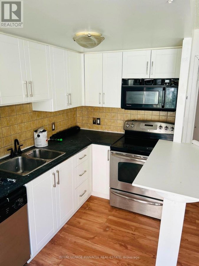 210 - 26 WESTERN BATTERY ROAD - Photo 3