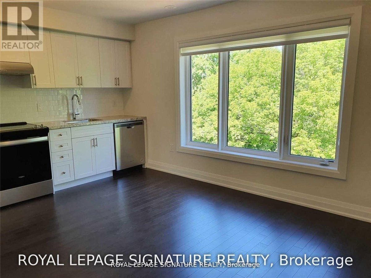 2 - 25 WILD ROSE GARDENS - Photo 2