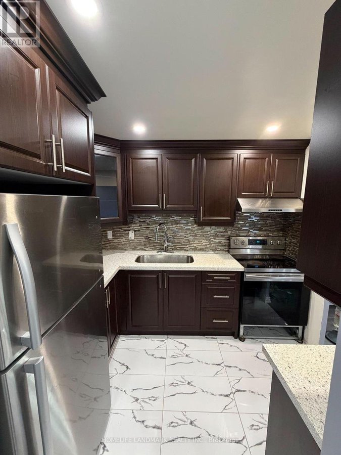 1703 - 180 MARKHAM ROAD - Photo 1