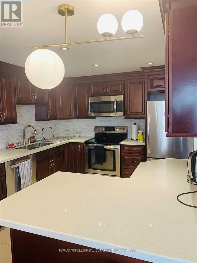 303 - 500 GLENCAIRN AVENUE - Photo 2