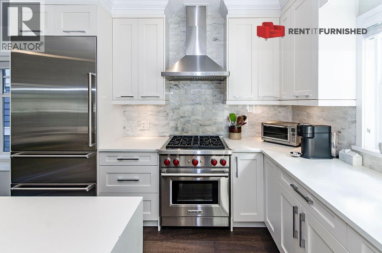 930 W 15TH AVENUE - Photo 6
